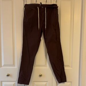 Vuori women’s ripstop dark maroon casual pants.